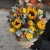 Композиция в сумке "Тональность" из подсолнухов, калл, ягод вибирнума, лимонных роз, скиммии и орхидеи в Кашире Композиция в сумке "Тональность" из подсолнухов, калл, ягод вибирнума, лимонных роз, скиммии и орхидеи в Кашире